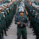 Cambodia's armed forces display anti-riot gear and assault rifles at the Olympic stadium ahead of a general election this weekend, in Phnom Penh, Cambodia, July 25, 2018.